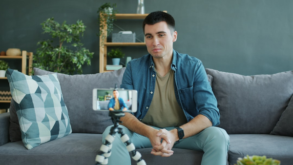 person recording video on smartphone